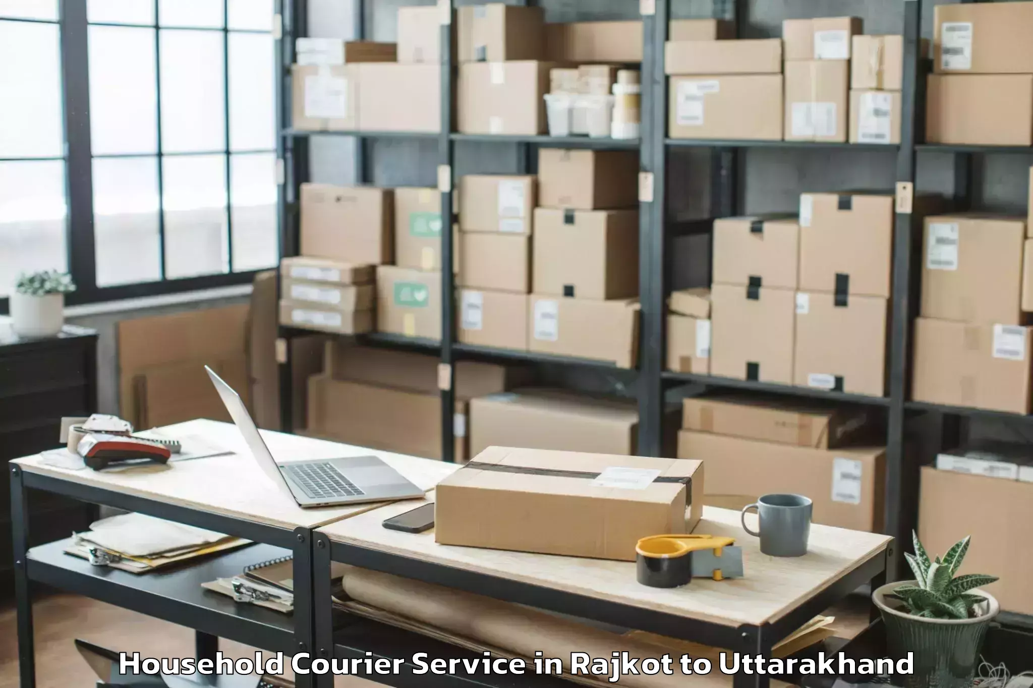 Hassle-Free Rajkot to Dhoomakot Household Courier